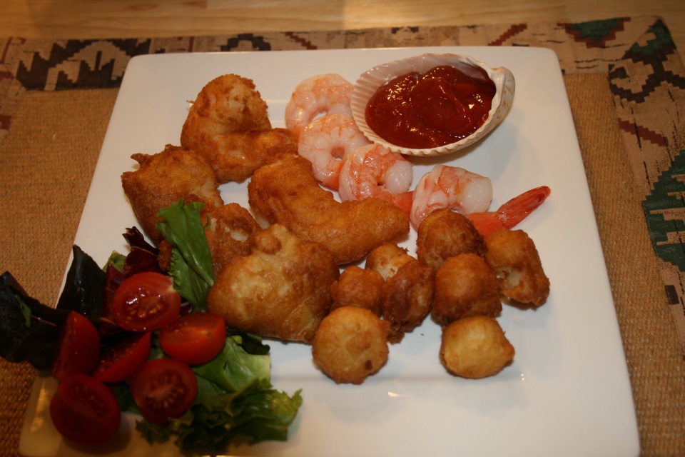 Click to enlarge - Beer battered halibut, shrimp and scallops share a plate with some Louisiana-style boiled shrimp.