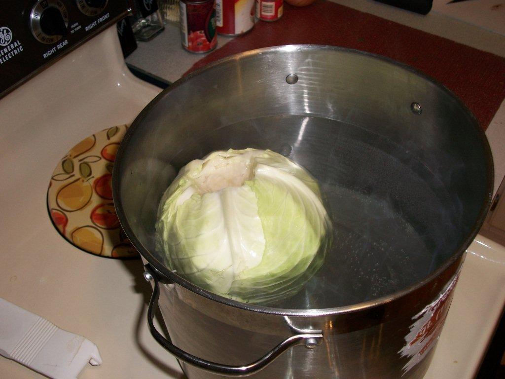 Click to enlarge - Place cabbage in boiling water, remove leaves as they wilt and become soft.