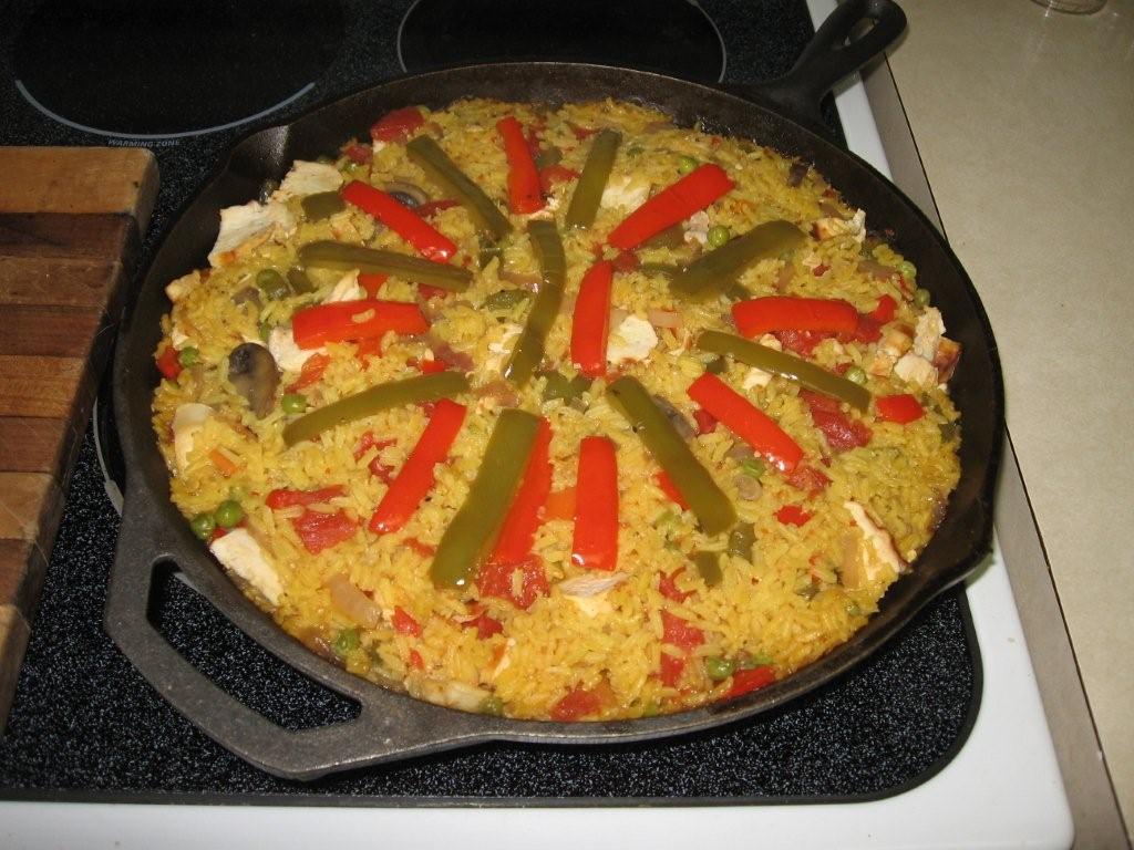 Click to enlarge -  Rice mixture with added vegetables and chicken ready for the oven for an additional 20 minutes.