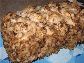 Meatloaf turned out of pan and basted with remaining soup and sliced mushrooms.