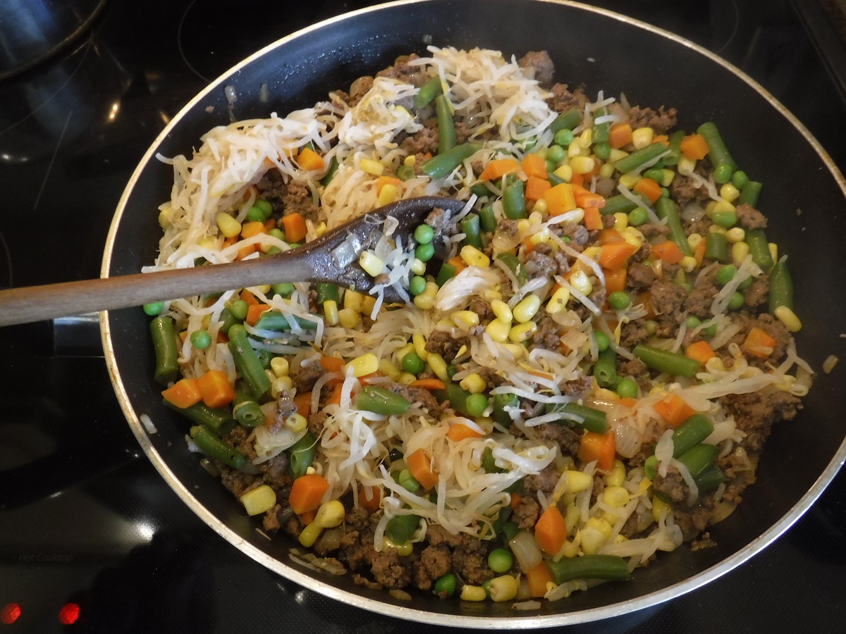 Click to enlarge - Beef fried to render fat, cooked vegetables added with the spices.