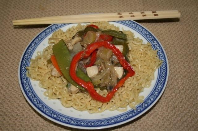 Chicken lo mein served over ramen noodles