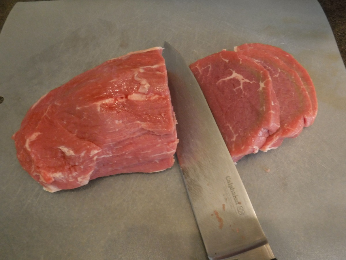 Click to enlarge - Pre-packaged stew beef is handy but you can control what cuts of meat  and by products by cutting your own beef morsels top just the right size.