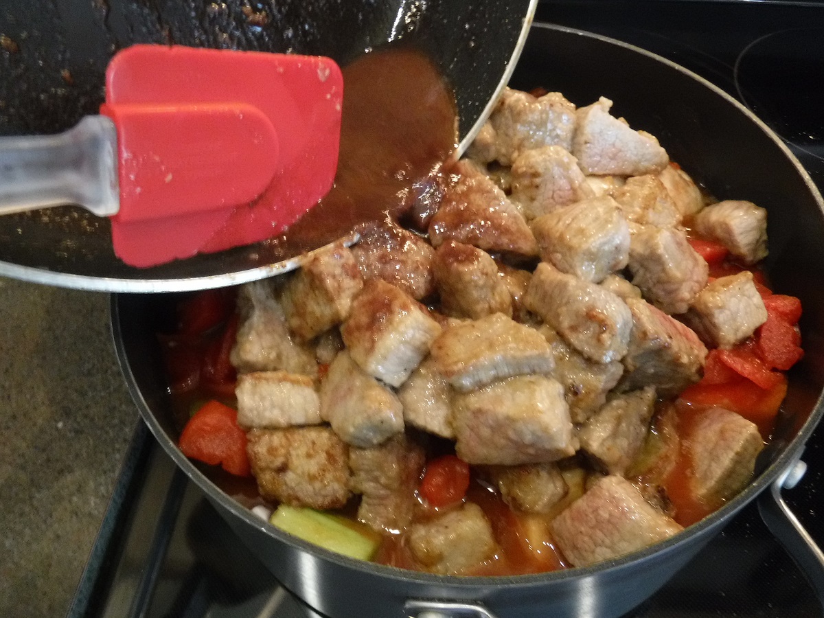 Click to enlarge - Add the deglazing liquid and brown bits to the stew pot.