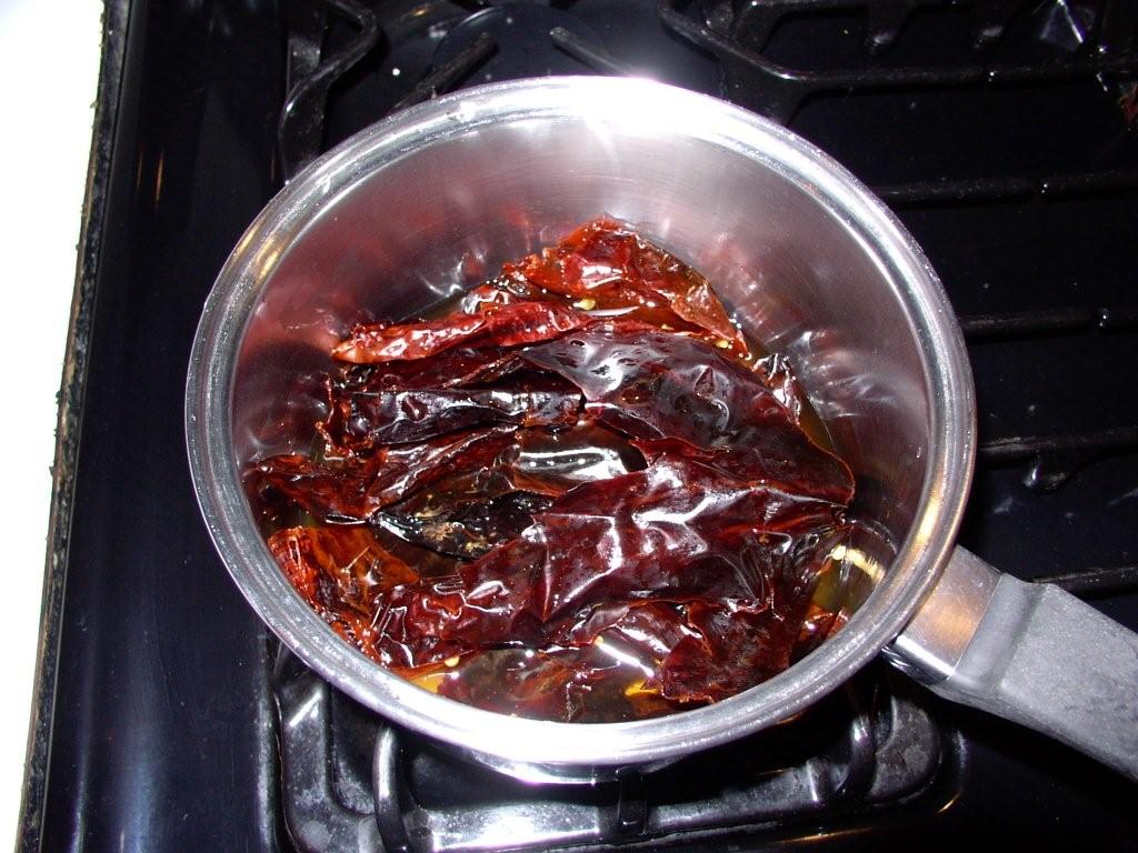 Click to enlarge - Put chiles in a saucepan with water and heat.