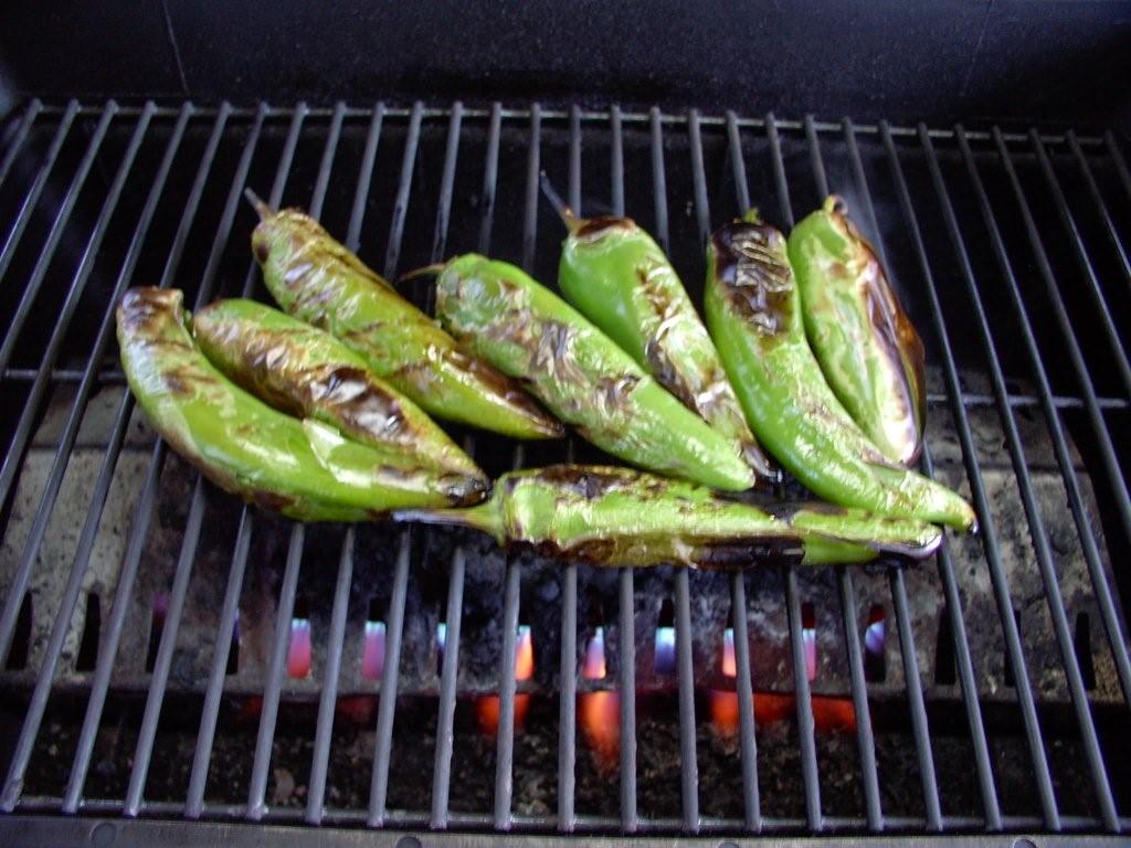 Click to enlarge - Roasting large batches of chiles on the barbecue grill.
