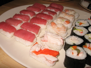 Nigirisushi some with ahi tuna, some with cooked shrimp.