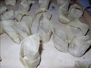 Left-over turkey won tons all made and ready for the soup pot.  