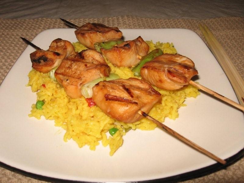 Click to enlarge - Tare Yakitori served on a bed of saffron rice.
